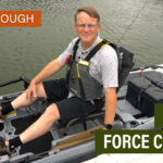 Kayak Angler editor Ric Burnley poses on a kayak equipped with the Garmin Force Current motor at ICAST 2025