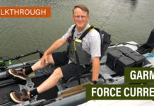 Kayak Angler editor Ric Burnley poses on a kayak equipped with the Garmin Force Current motor at ICAST 2025