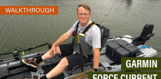 Kayak Angler editor Ric Burnley poses on a kayak equipped with the Garmin Force Current motor at ICAST 2025