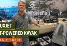 Editor Ric Burnley standing next to the new FluxJet jet-powered fishing kayak.