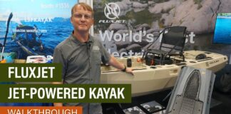 Editor Ric Burnley standing next to the new FluxJet jet-powered fishing kayak.