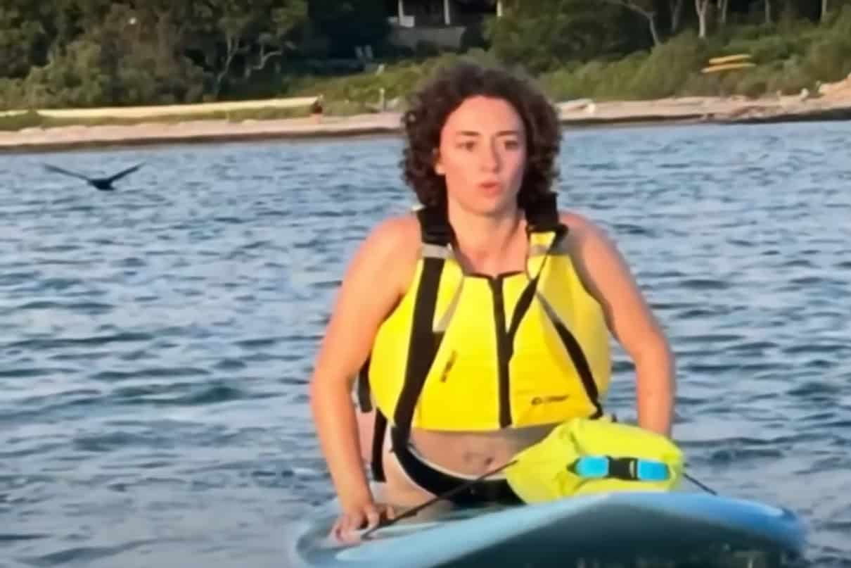 Paddleboarder Madeleine Cronin reacts to spotting a great white shark near friend, Margaret Bowles.