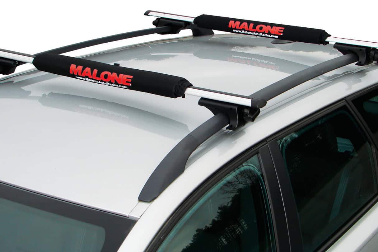 Foam pads covered with protective cover attached to rack crossbars.