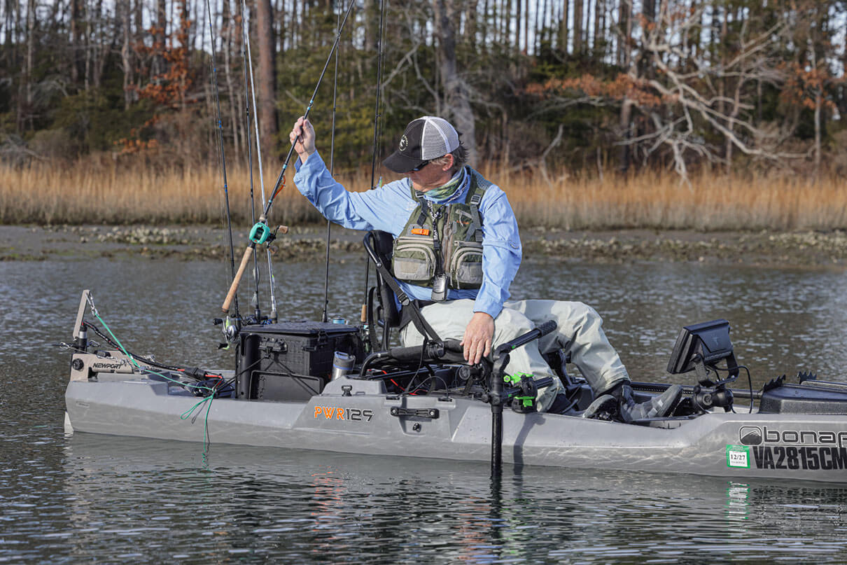 Ric Burnley reaches back for a rod from the seat of the Bonafide PWR129
