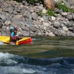 Whitewater Canoe Review: Esquif Ocoee Elements Adventure Company guide and instructor Emily Cole doing what the Ocoee does best—precision paddling