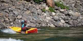 Elements Adventure Company guide and instructor Emily Cole doing what the Ocoee does best—precision paddling