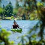 Kayak Review: Lekker Osprey Joe Potoczak paddles the Lekker Osprey with leafy foliage in front