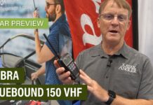 Kayak Angler editor Ric Burnley holding the Cobra BlueBound 150 VHF radio.