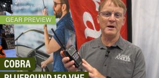 Kayak Angler editor Ric Burnley holding the Cobra BlueBound 150 VHF radio.
