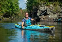 Woman paddles Stellar’s three-piece modular S14 G2 light touring kayak