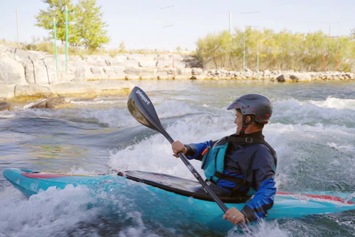 Kayaker enters a rapid.