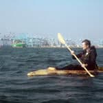Sam Shoemaker in his mushroom boat entering the Port of Los Angeles on August 5, 2025. | Image: Jordan Freeman / Courtesy Fulcrum Arts