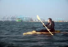 Sam Shoemaker in his mushroom boat entering the Port of Los Angeles on August 5, 2025. | Image: Jordan Freeman / Courtesy Fulcrum Arts