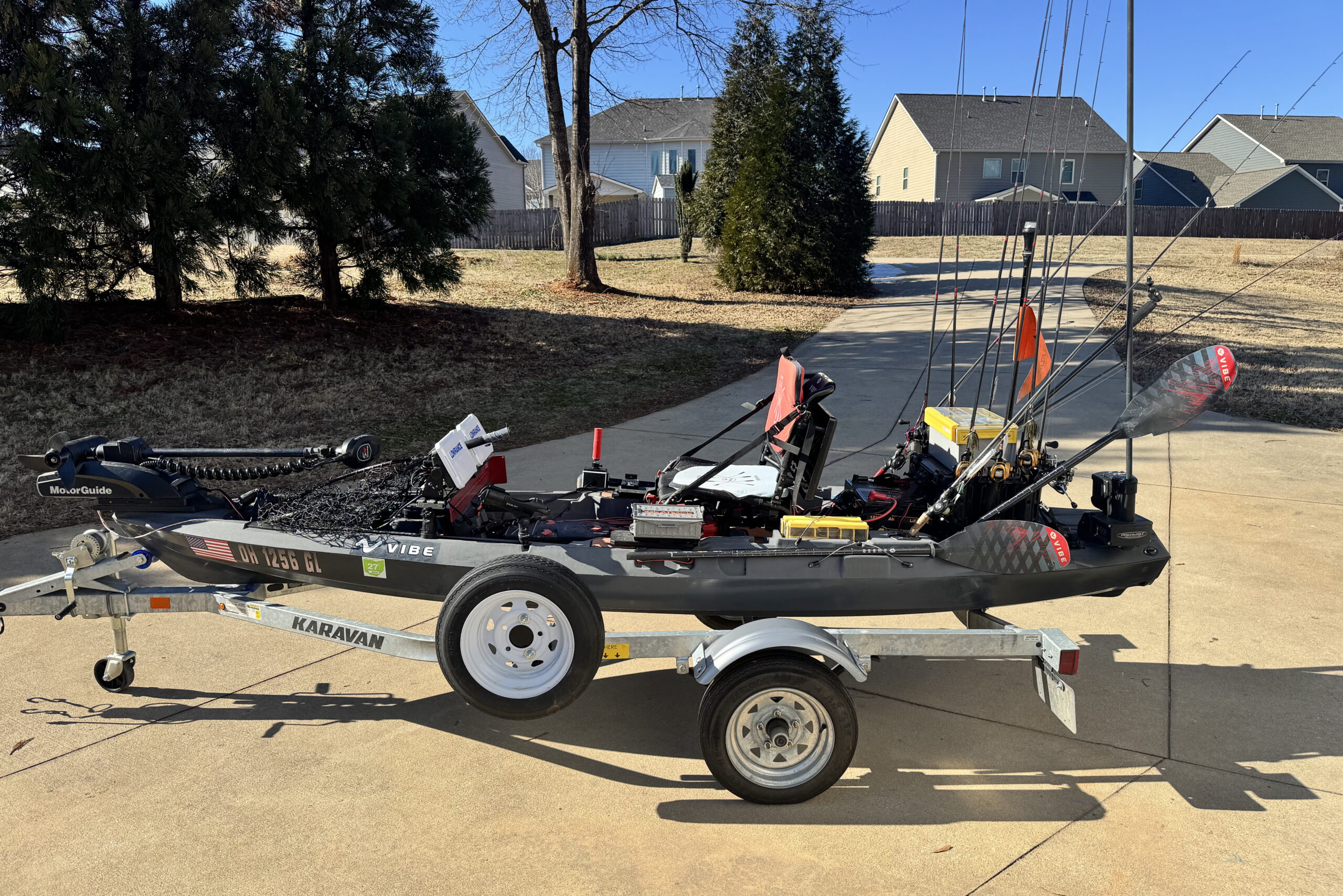 Kayak with added motor, batteries, and anchor system.
