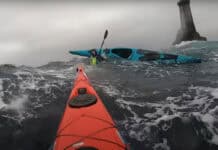 image of a capsize in a sea kayak in rough water.
