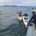 Kayakers are rescued in the San Juan Islands. Feature Image: USCG Petty Officer 1st Class Steven Strohmaier