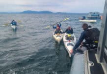 Kayakers are rescued in the San Juan Islands. Feature Image: USCG Petty Officer 1st Class Steven Strohmaier