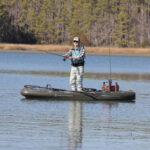 Kayak Angler editor Ric Burnley stands and casts from the iATAK 110