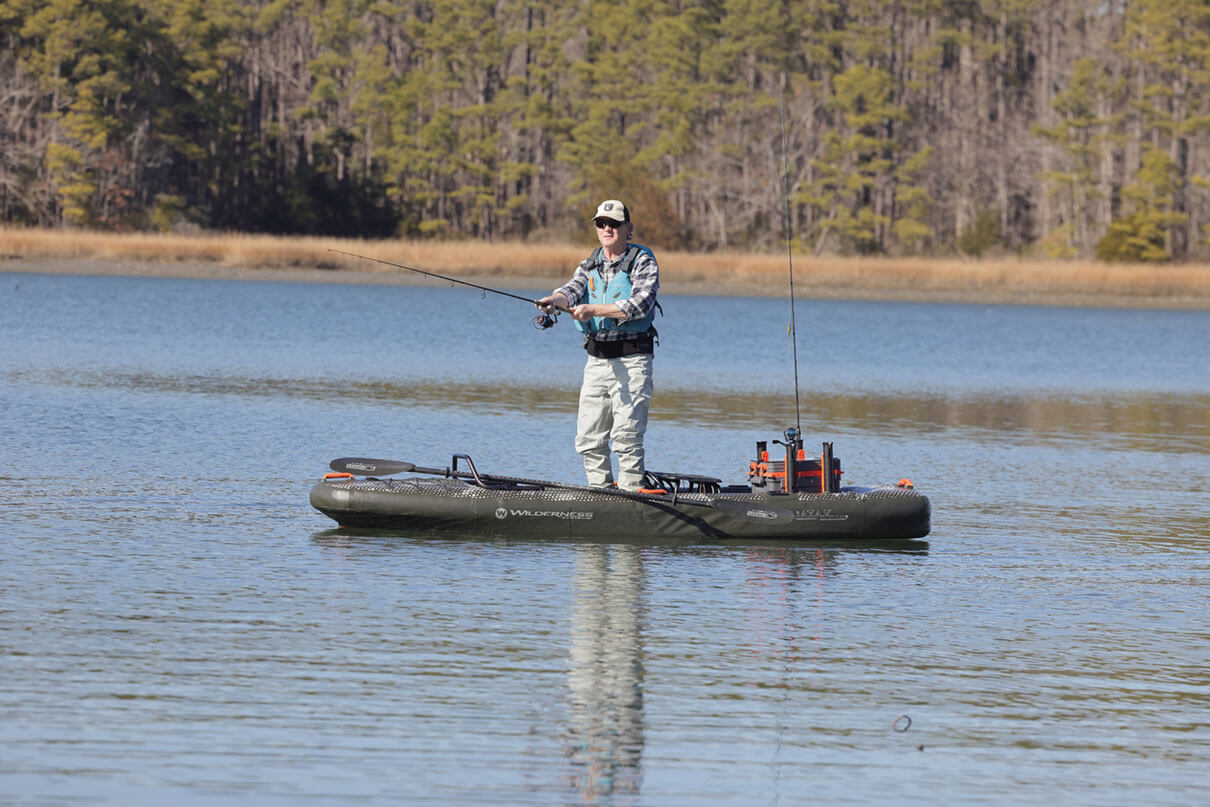 Kayak Angler editor Ric Burnley stands and casts from the iATAK 110