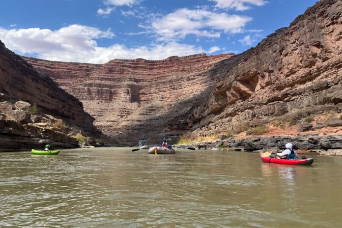Asa McCallum and family paddle on the San Juan river