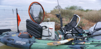 DIY kayak livewell setup on a Jackson fishing kayak parked in the flats