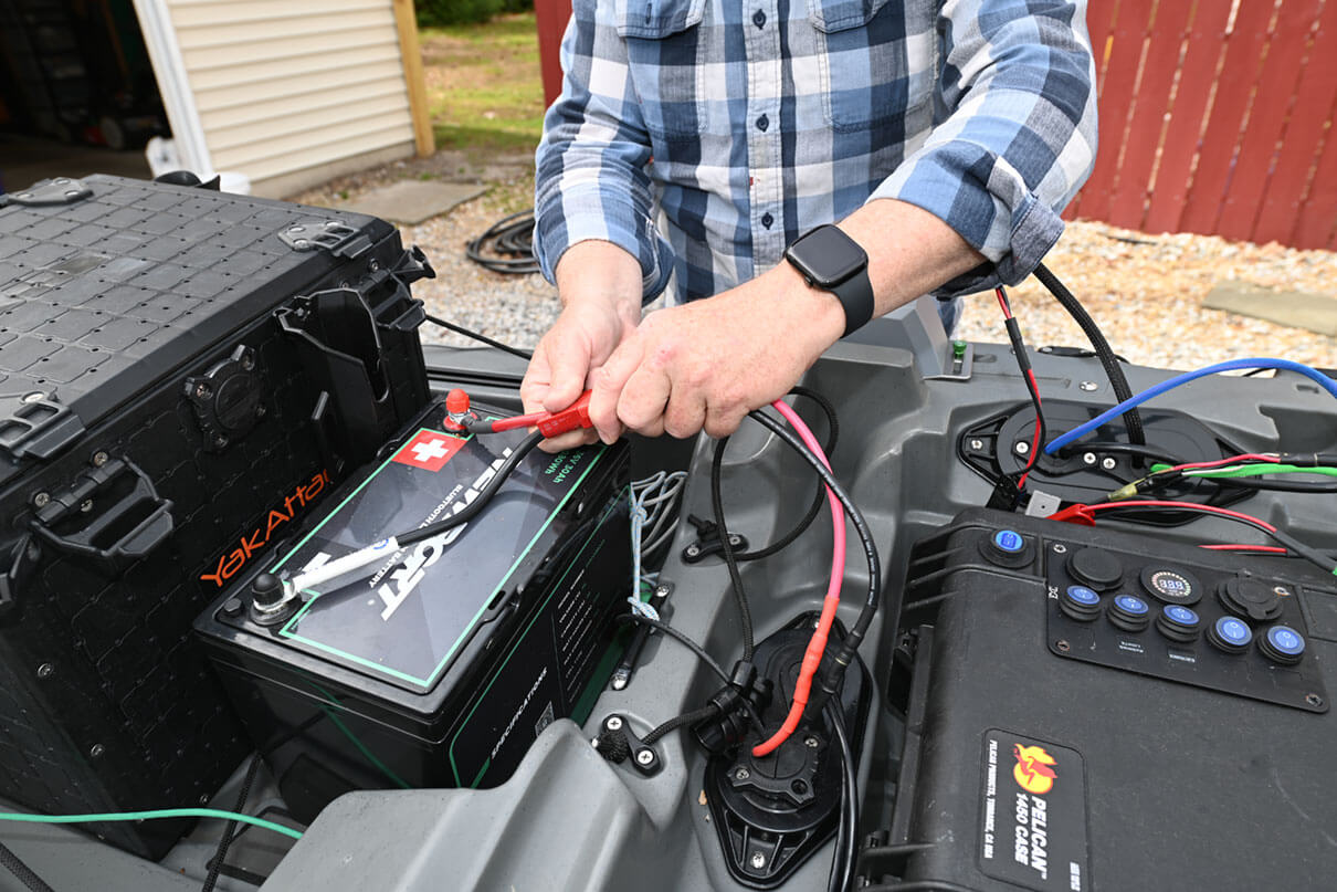 Kayak angler editor Ric Burnley demonstrates how to connect electronics to batteries when rigging your fishing kayak