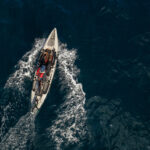 Deep Into The Drink: Pacific Mothership Trip Scores Bluefin Tuna overhead photo of Howie Strech on his fishing kayak with bluefin tuna on the deck during his mothership trip from La Jolla