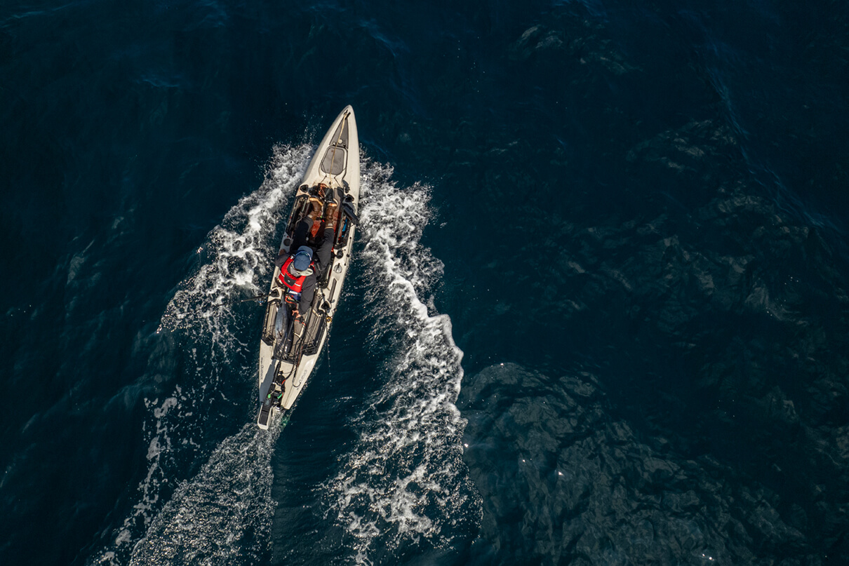 overhead photo of Howie Strech on his fishing kayak with bluefin tuna on the deck during his mothership trip from La Jolla