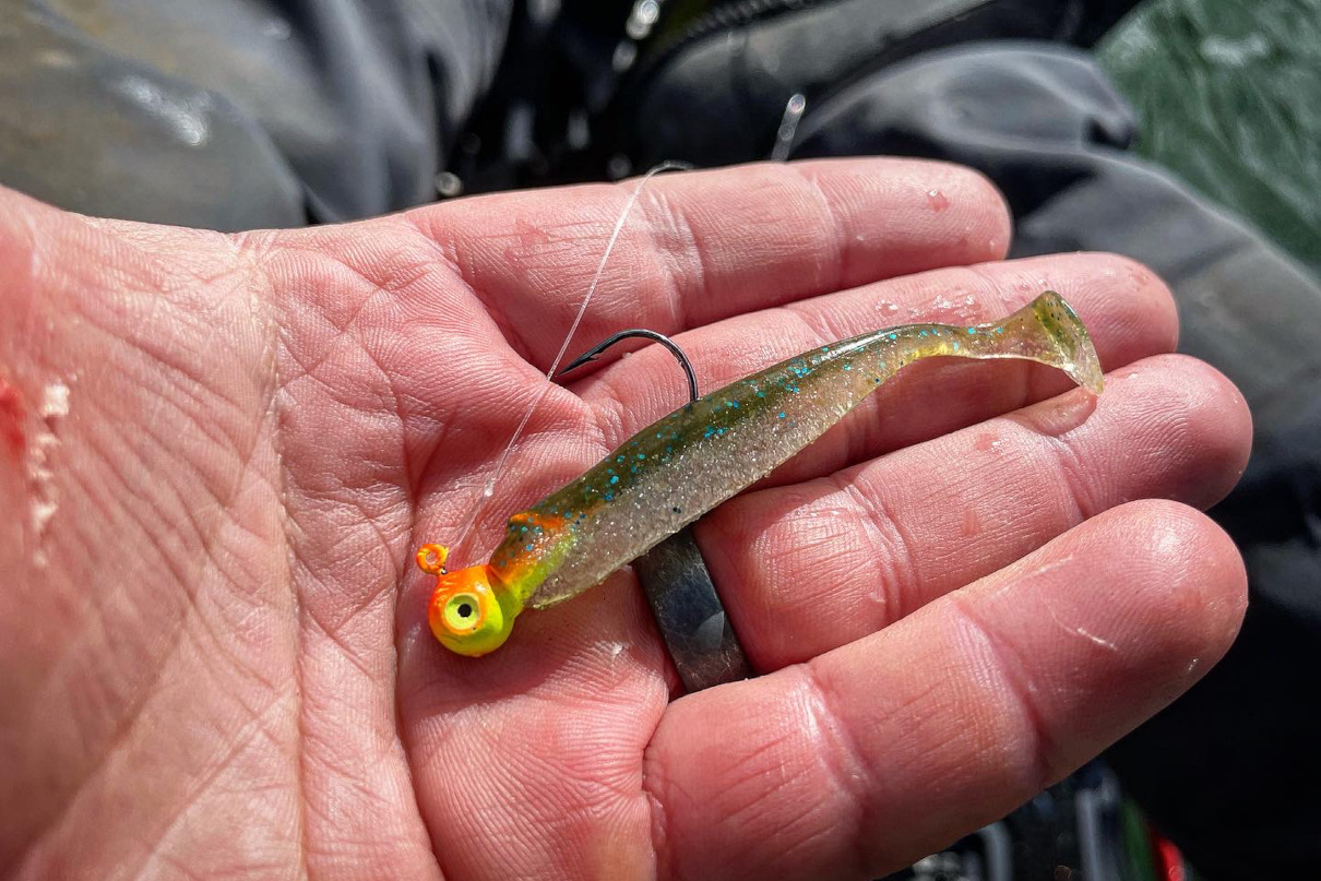 holding a Keitech soft plastic.