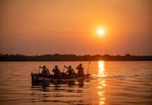 Fastest Known Paddle Could Be The New Frontier In Paddlesports Scott Miller, creator of the Fastest Known Paddle website, is seen in the stern during 2023’s record-setting Mississippi speed run
