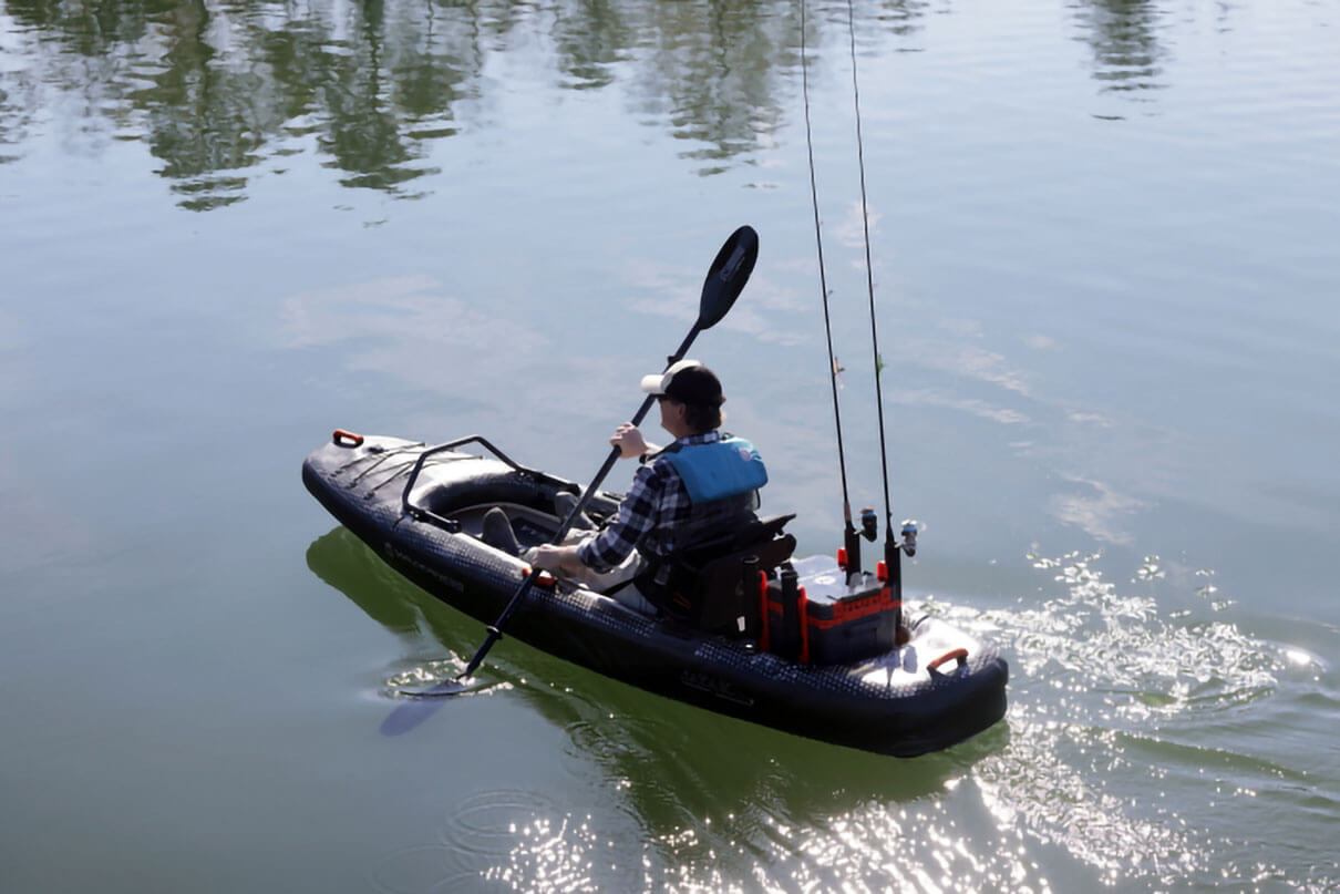 Kayak Angler editor Ric Burnley paddles an iATAK inflatable fishing kayak from Wilderness Systems