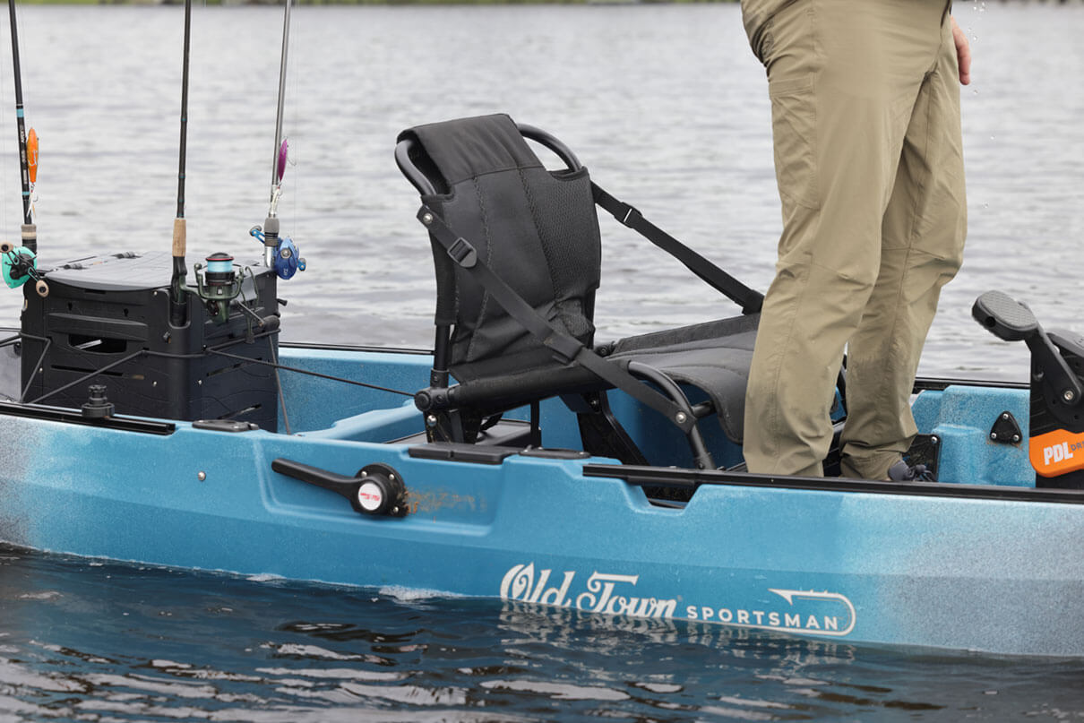 Detail photo of Kayak Angler editor Ric Burnley standing and casting from the Old Town Sportsman 120 Pro