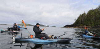 13 Industry Leaders On The State Of Kayak Fishing a group of kayak anglers fish on the water