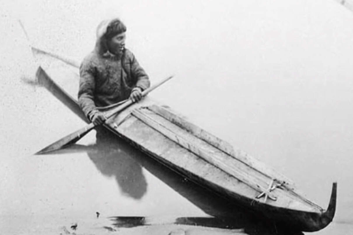 Image of a hunter in an Inuvialuit kayak.