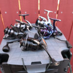 Best Spinning Reels For 2026 A collection of fishing reels.