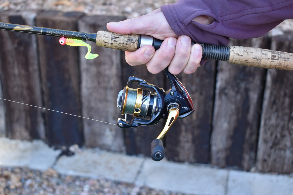 The author showing how to hold a spinning rod.