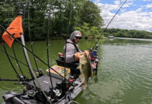 Jake Suvak Wants Kayak Anglers To Get In Shape Jake Suvak poses with a fish for Fit to Fish Challenge. Feature Image courtesy Jake Suvak.