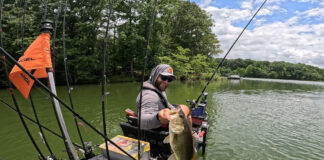 Jake Suvak Wants Kayak Anglers To Get In Shape Jake Suvak poses with a fish for Fit to Fish Challenge. Feature Image courtesy Jake Suvak.