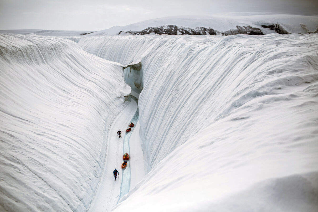 Dragging 200-pound loads through the most inhospitable terrain