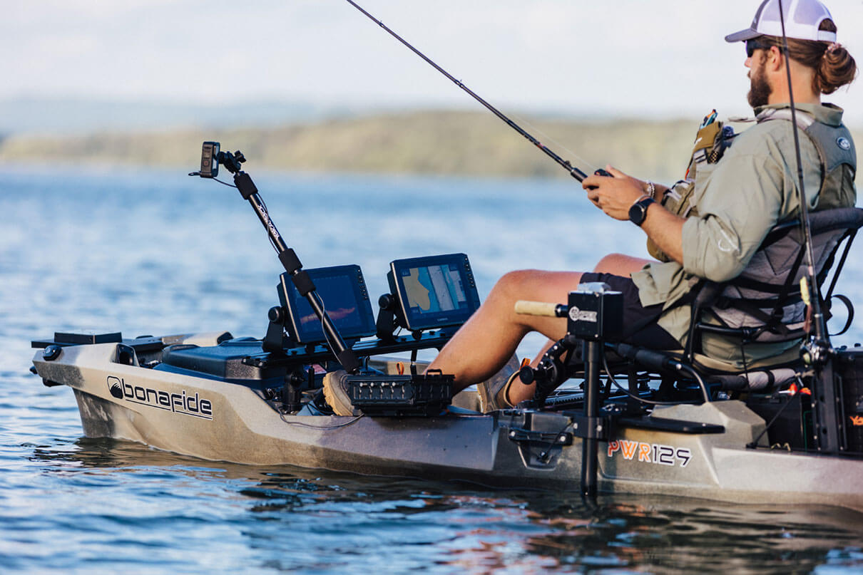 Man fishes from a Bonafide kayak equipped with dual fish finders