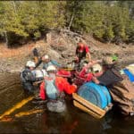 Kayakers Find Mysterious Submerged Car In Ottawa River (Video) Image of kayakers rigging a sunken stolen car to remove it from the Ottawa River.