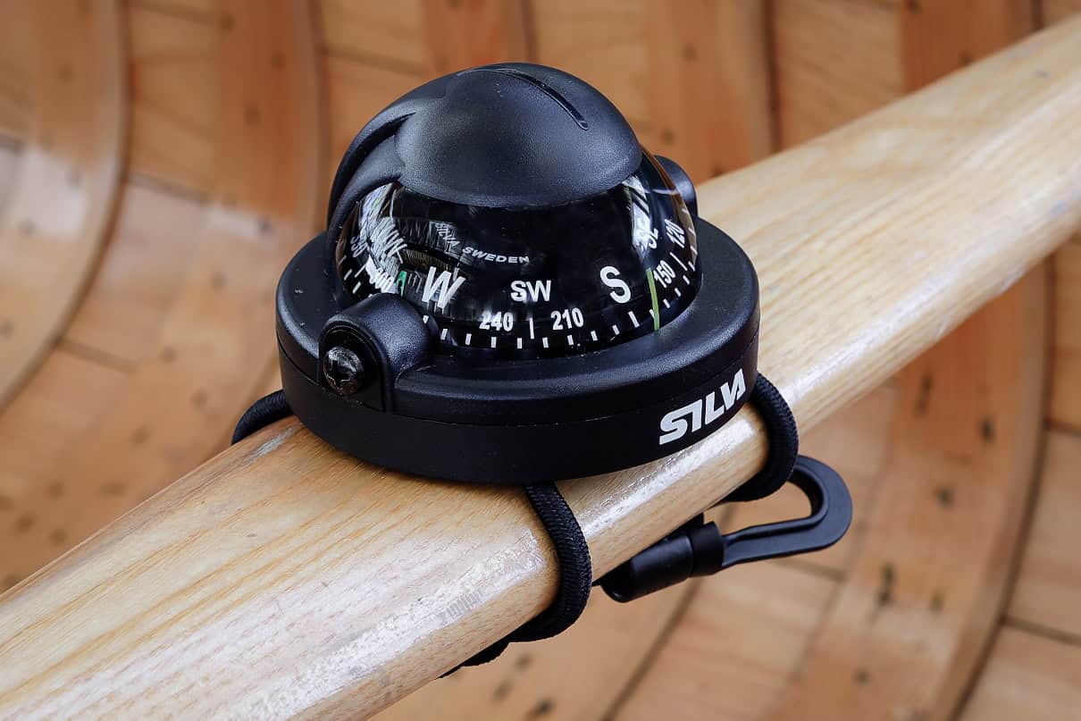 A navigational tool strapped to a canoe.