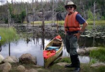 Cliff Jacobson On What’s Changed For Better And Worse In 70 Years Of Canoeing canoeist and symposium presenter Cliff Jacobson poses in the wilderness beside a tripping canoe