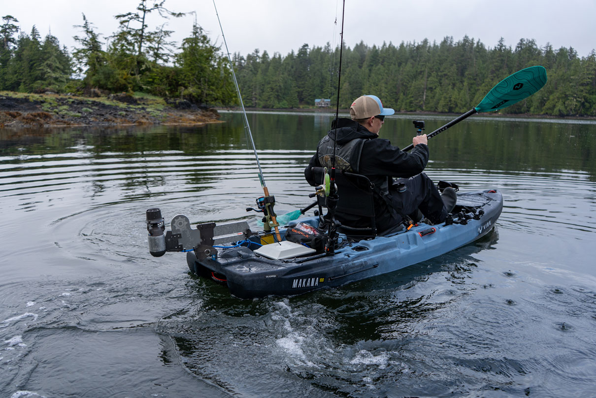 stern of a fully rigged fishing kayak on the water on Vancouver Island