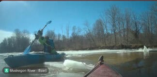 Kayaker Who Was Trapped Under Ice Shares Harrowing Encounter (Video) Image of a kayaker recovering another kayak on the Muskegon River in Michigan