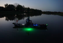 Light It Up: DIY Kayak Lighting In One Day Cory Byrnes in his kayak at dusk with DIY lighting installed
