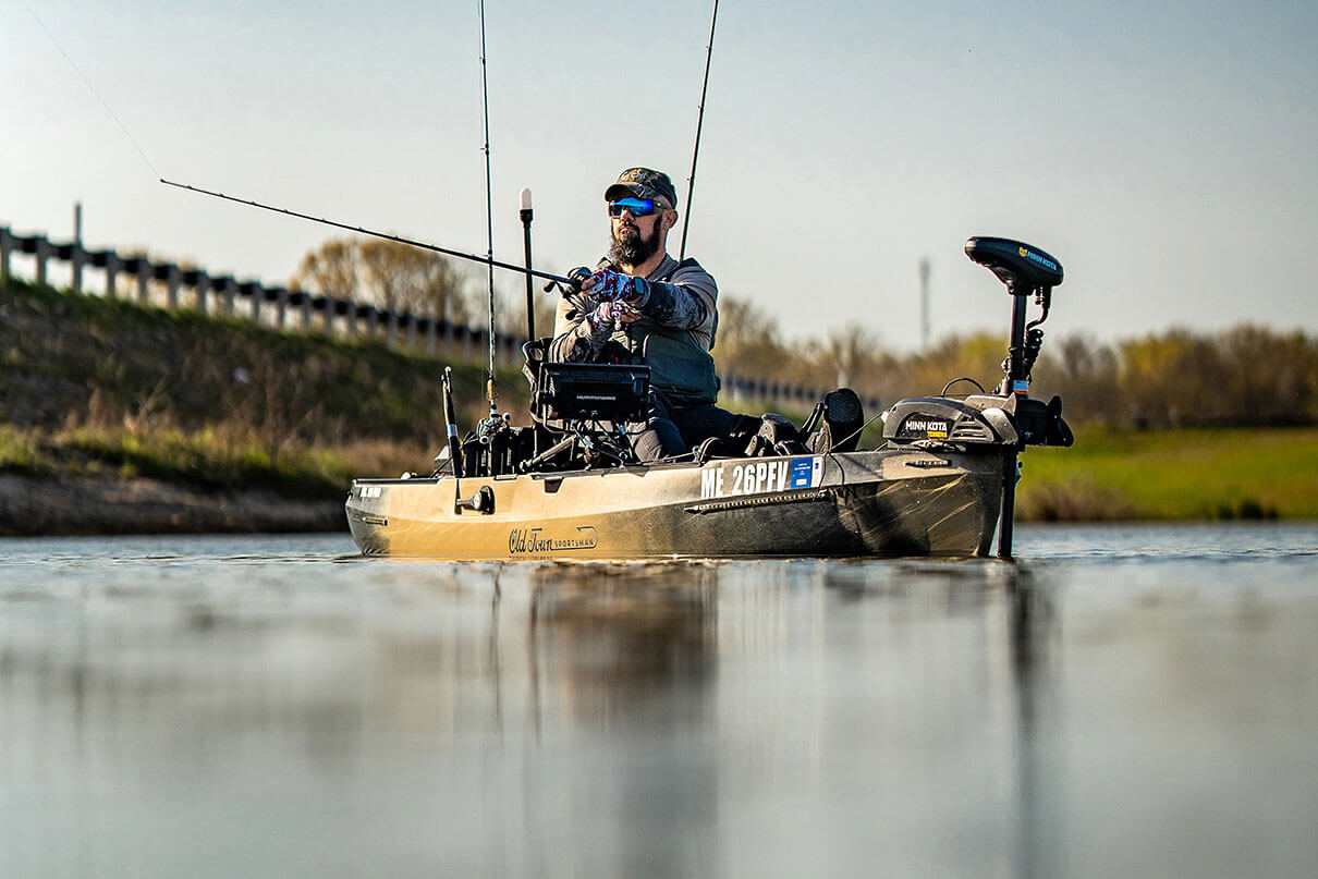 man fishes from a kayak equipped with the Minn Kota Terrova motor