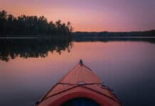 The Best Tested And True Paddling Gear, Because If It Isn’t Broken Why Fix It A wilderness systems pungo kayak on a calm lake