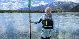 A New Class Of PFD Has Arrived—Here’s What To Know Paddling Magazine Publisher Cristin Plaice wearing a Level 50 life jacket.