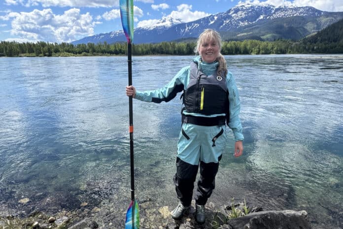 Paddling Magazine Publisher Cristin Plaice wearing a Level 50 life jacket.